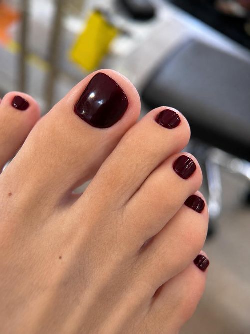 Deep burgundy dry pedicure