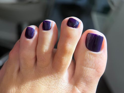 Deep purple dry pedicure