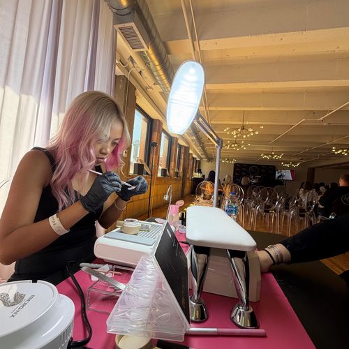 Swan Thang working at a manicure station at Sky Spa